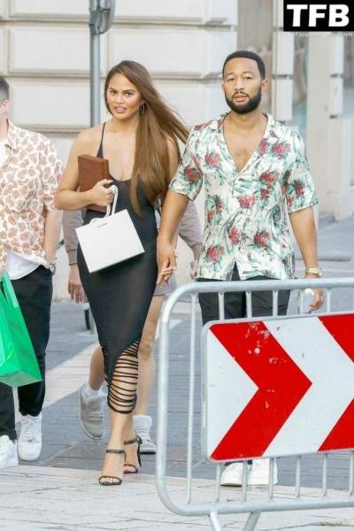 Chrissy Teigen Goes Braless Under a Very Sexy Sheer Black Dress in France - France on fansgirls.net