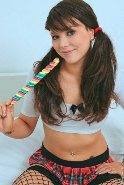 Naughty Babe Natalia Forrest Poses In Her Stockings And Sucks On A Lollipop To Make Us Sweat on fansgirls.net