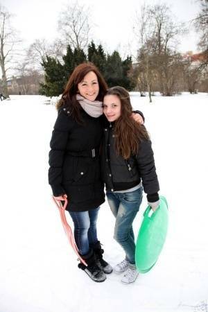 Young lesbians lick and finger twats after a day of sledding in the snow on fansgirls.net