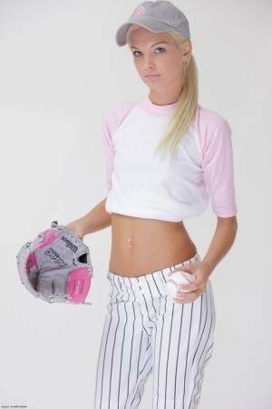 Baseball cutie Francesca loses her uniform to expose her skinny teen body on fansgirls.net