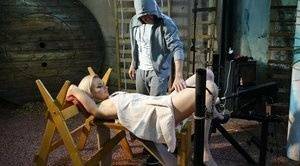 Restrained blonde Roxy Lee is penetrated by a machine dildo on fansgirls.net
