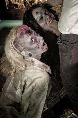 Fetish models Brittany Lynn and Jessie Lee giving head in Zombie threesome on fansgirls.net