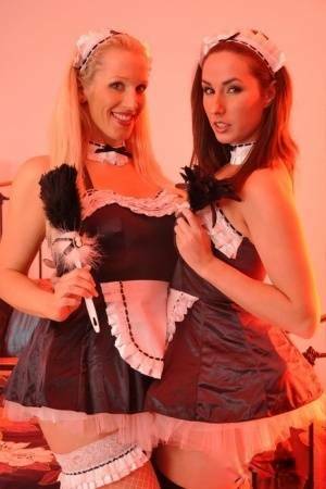 British maids Paige Turnah & Rebecca More have lesbian sex on a bed - Britain on fansgirls.net