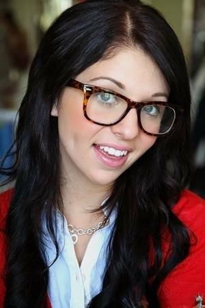 Glasses on round face of cute girl Madelyn Monroe stress her tiny tits on fansgirls.net