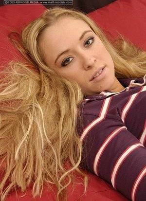 Blonde amateur Amber uncups A-cups tits before fingering her naked pussy on fansgirls.net