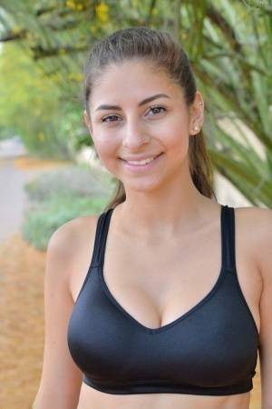 Teen jogger pauses to take off her spandex pants and bra on a run on fansgirls.net