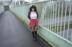 Amateur woman Barby Slut exposes herself in public while wearing black boots on fansgirls.net