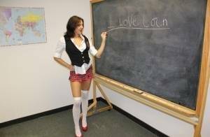 Naughty schoolgirl Cherry Poppins seduces a fellow student in slut wear on fansgirls.net