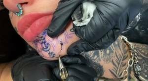 Tattoo enthusiast Amber Luke gets a new face tat from a female artist on fansgirls.net