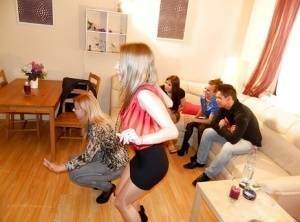 Fully clothed pornstars have some pissing fun at the house party on fansgirls.net