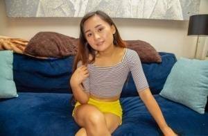 Petite Asian teen Elle Voneva engages in POV sex with a white cock on fansgirls.net