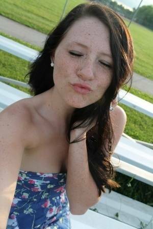 Teen solo girl Freckles 18 exposes her upskirt panties at a ball diamond on fansgirls.net