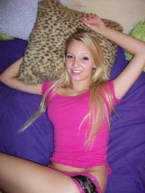 Cute teen girl with blonde hair shows off her tits and twat for the first time on fansgirls.net