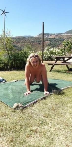 Mature amateur sports a creampie after sex atop a picnic table on fansgirls.net