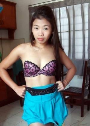 Cute Filipina girl strips naked in the confines of a sex tourist on fansgirls.net