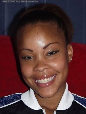 Black amateur Candice flashes a nice smile before baring her great body on fansgirls.net