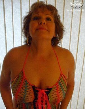 Mature woman Busty Bliss wears see thru attire during POV action on fansgirls.net