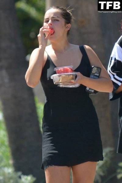 Addison Rae Indulges in Some Refreshing Watermelon While Out in a Tight Skirt with Her Boyfriend on fansgirls.net