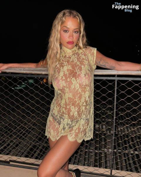 Rita Ora Shows Off Her Nude Boobs While Posing in a Sheer Dress (2 Photos) on fansgirls.net